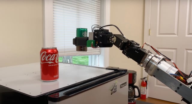 Model R2 robotic arm picking Starbacks coffee can