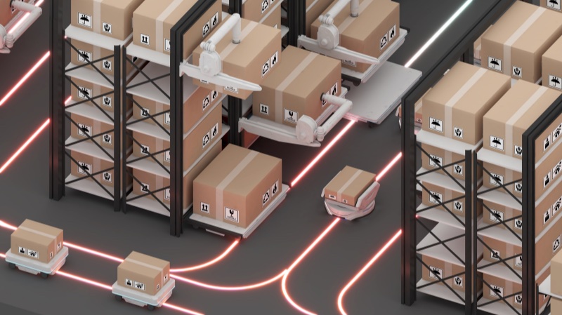 a group of autonomous guided vehicles (AGVs) work together in a warehouse setting to transport boxes along guided routes autonomously.