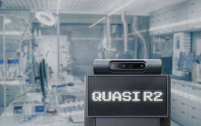 Quasi Model R2 Robot with Stereo Vision pictured with a background of a laboratory