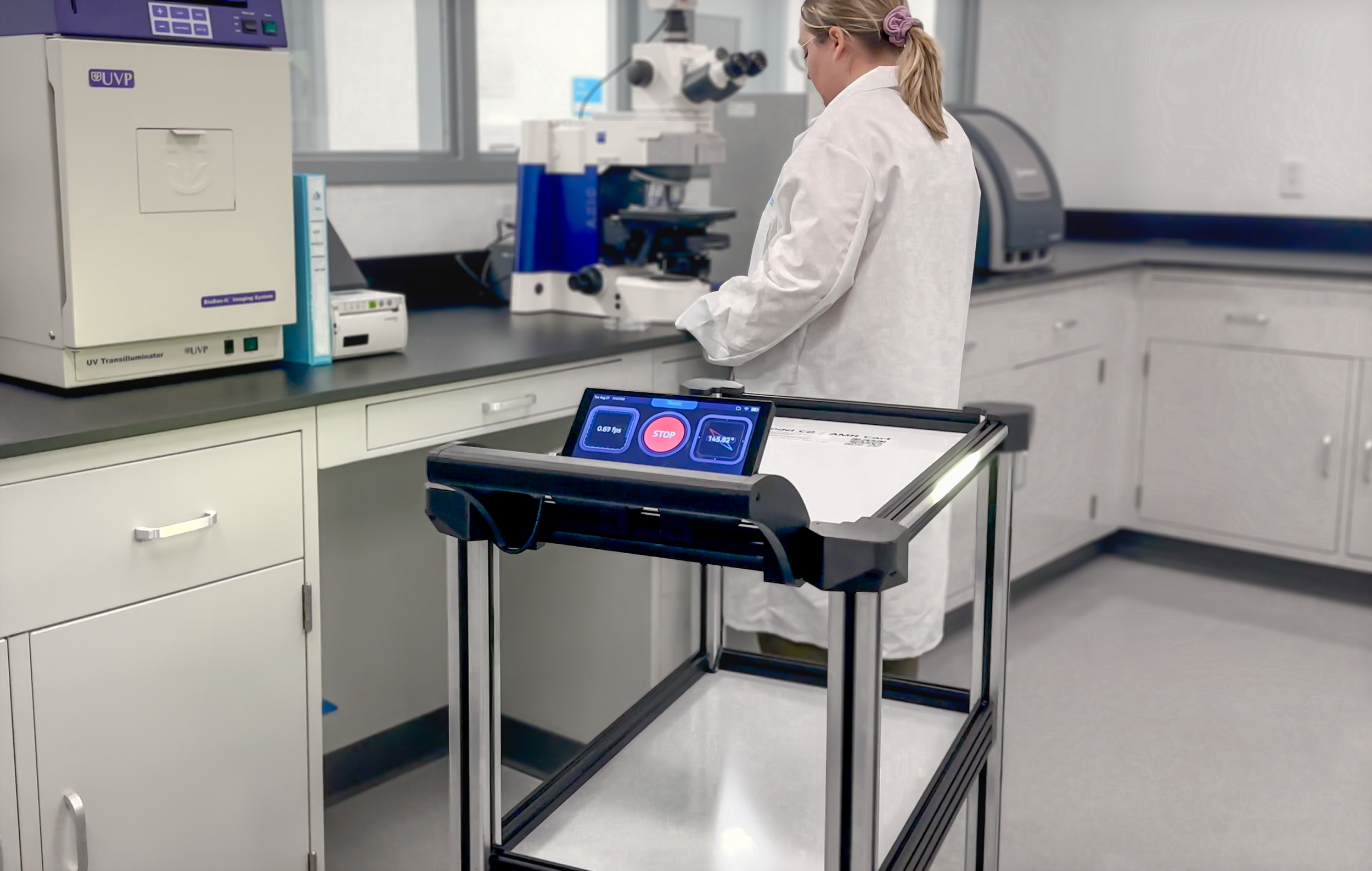 c2 lab 1 original Model C2 robotic scart navigates across a laboratory floor to provide on-demand delivery of reagents, samples, components, and supplies to busy lab technicians.